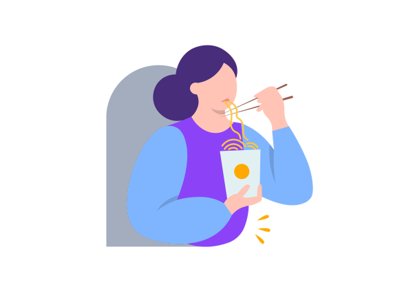 A woman eating cup noodles